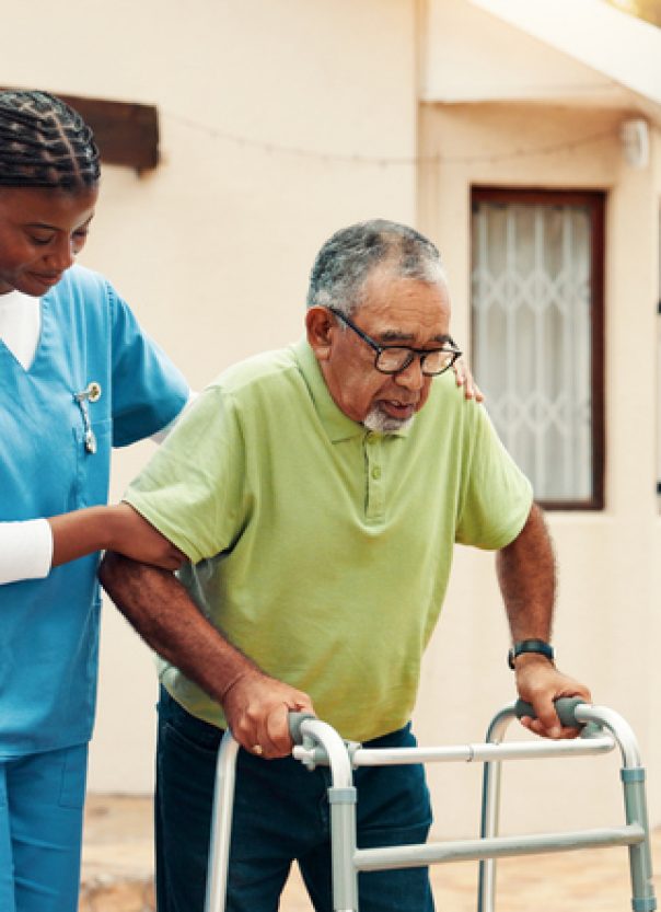 Nurse, senior man and outdoor with walker, help and support for recovery with injury at retirement village. Caregiver, elderly patient or person with disability with steps, frame and rehabilitation Caregiver helping senior man walk