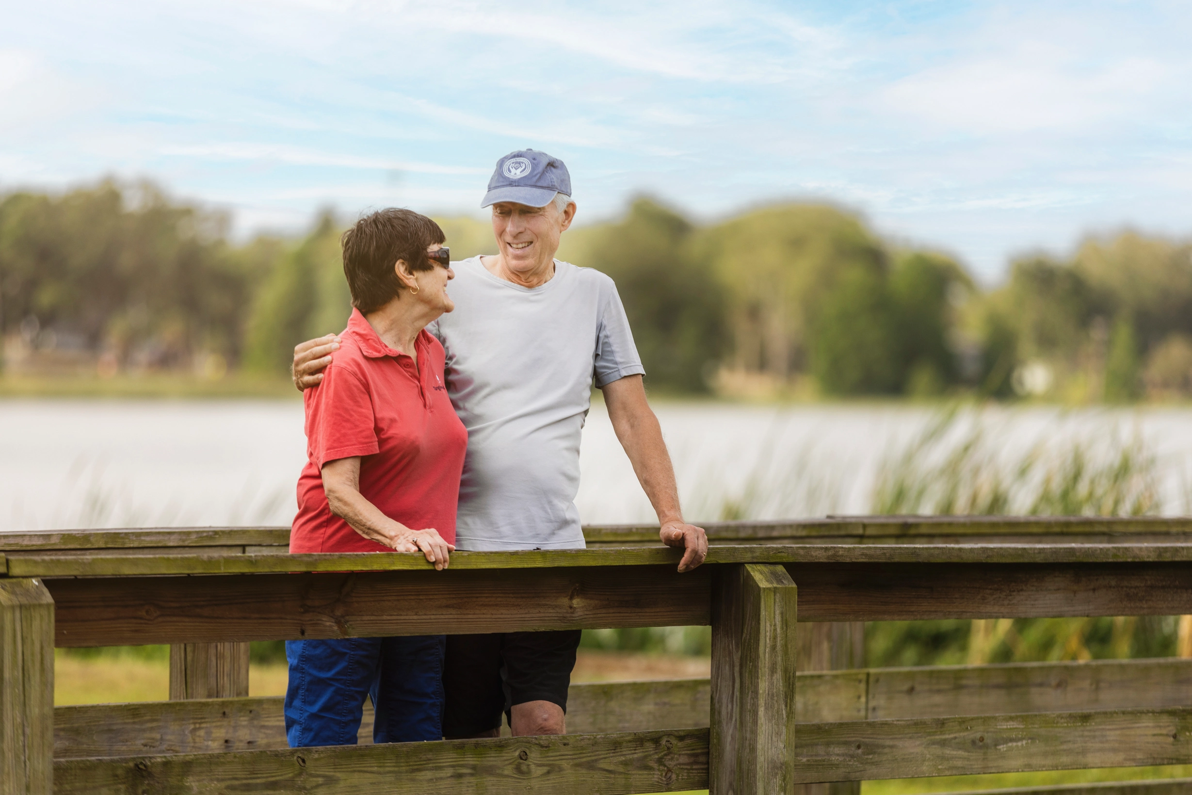 Senior couple standing by water