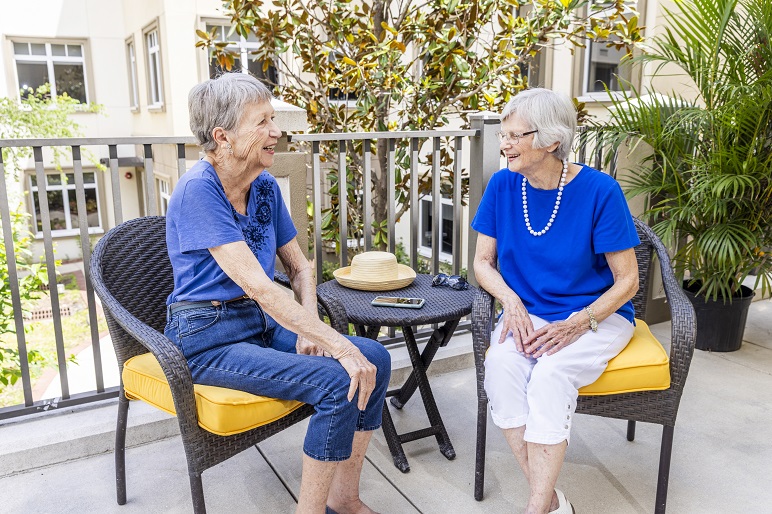 Senior ladies on the porch discussing life