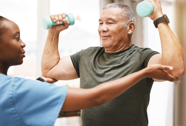 Senior physical therapy with caregiver