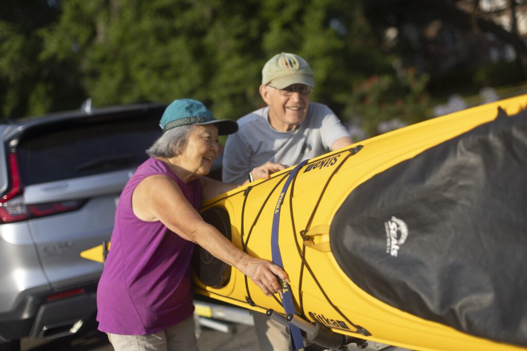 seniors packing kayak