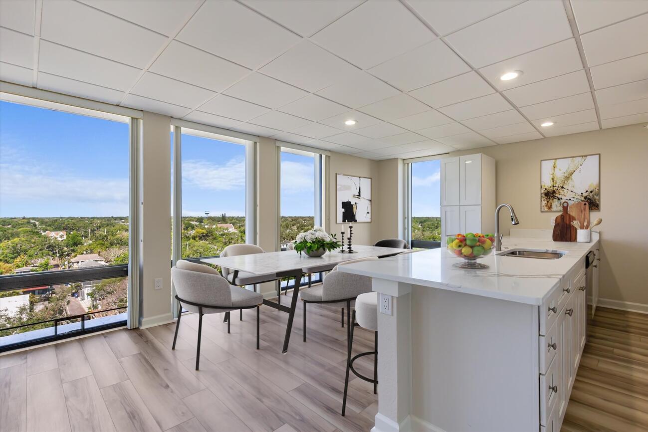 bright, open plan apartment with floor to ceiling windows