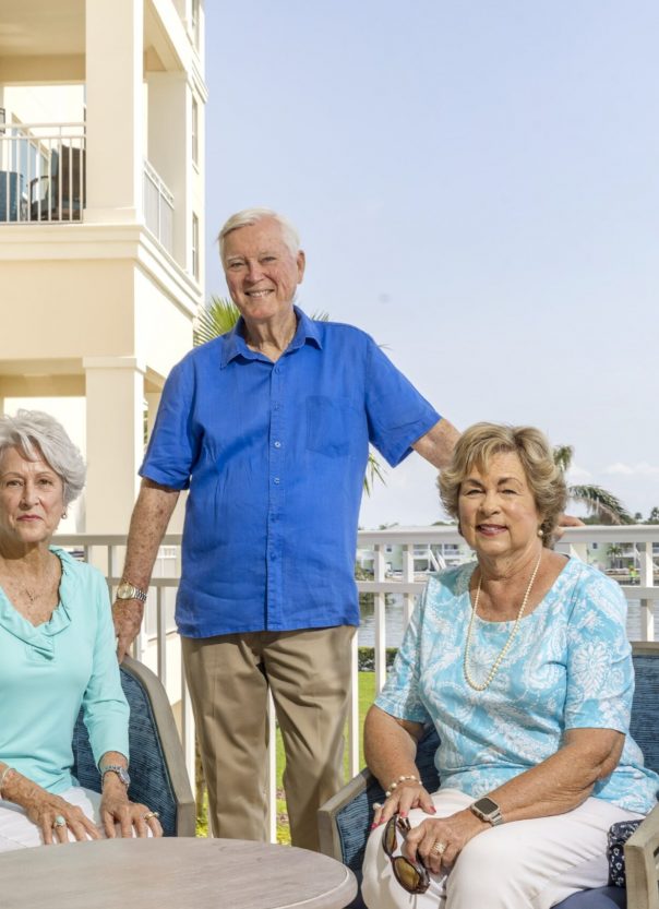 seniors sitting outside on a patio