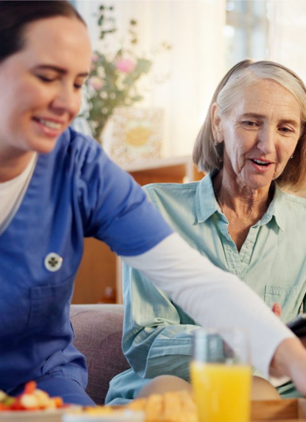 Breakfast, nurse and senior woman in nursing home for elderly care, nutrition and support. Retired female person, caregiver and service for hungry patient in assisted living, healthcare and wellness