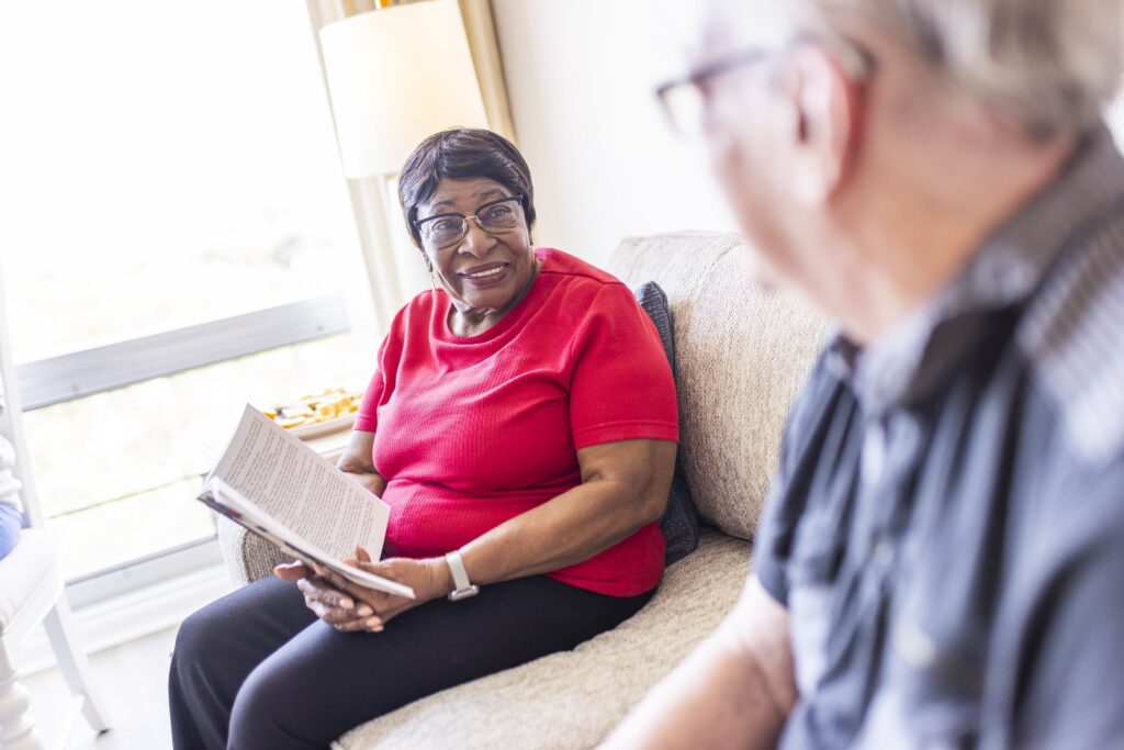 Senior Woman Smiling and Reading