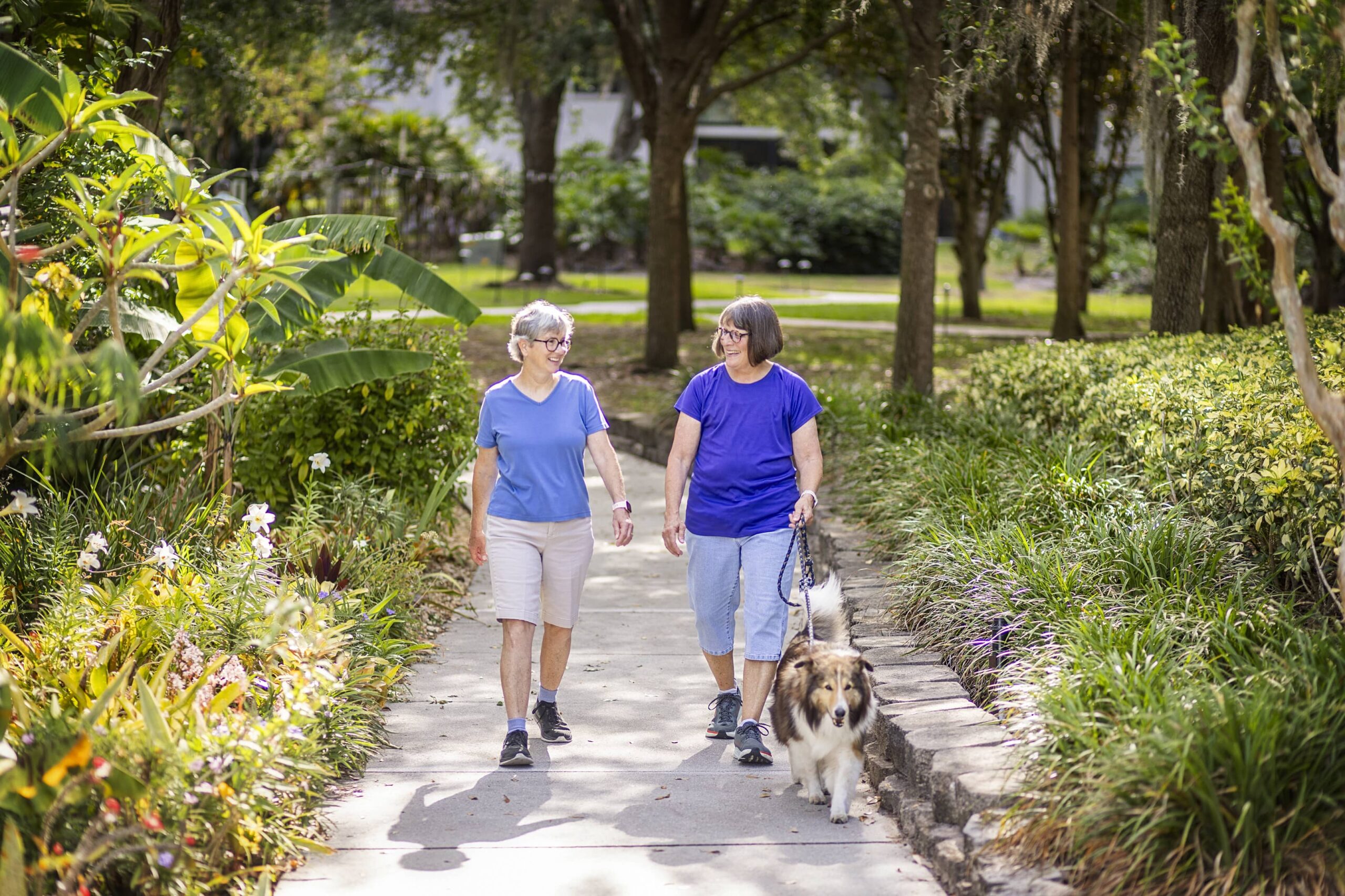 Senior Women Walking Outside Smiling, With Dog_0484