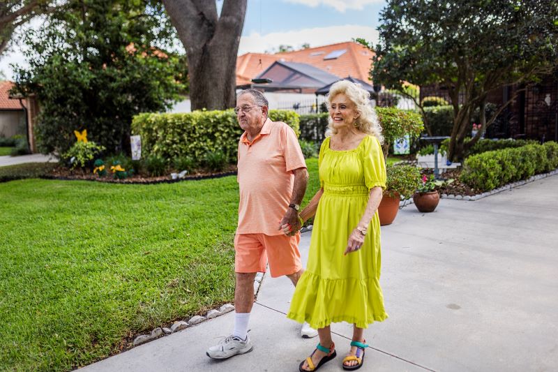senior couple walking outside together