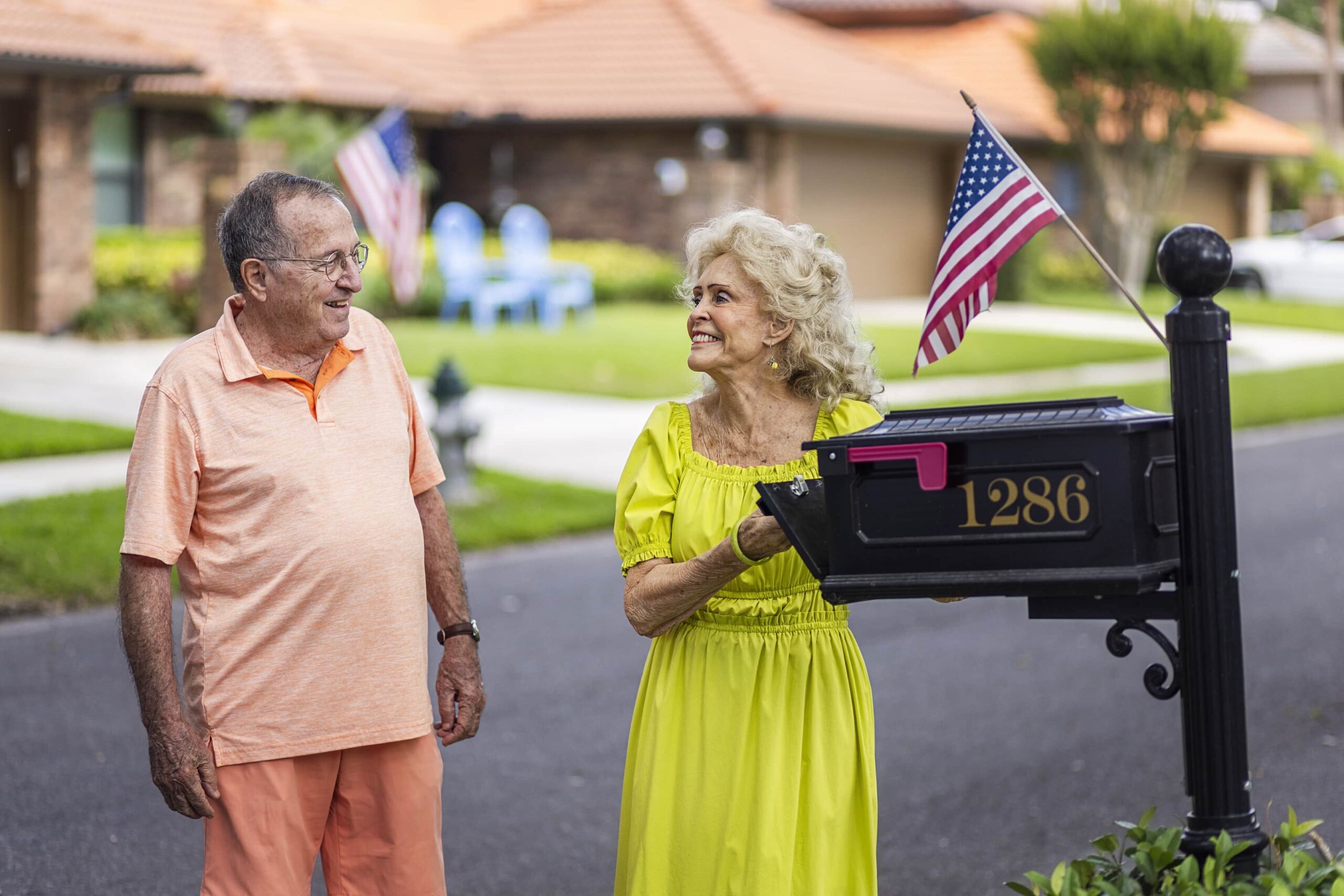 Man and Woman Smiling at Mailbox_0668