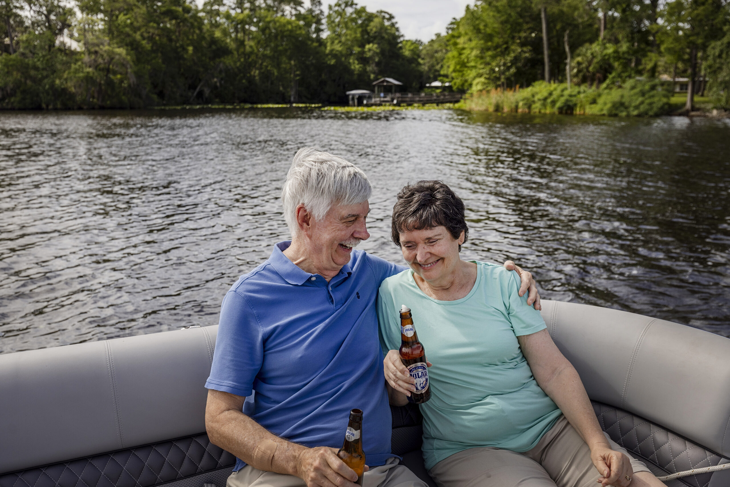 seniors on boat drinking