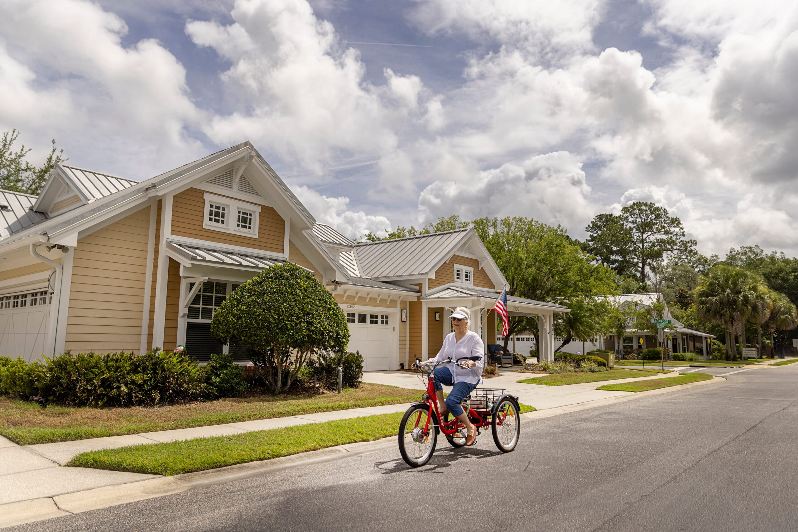 senior riding tricycle