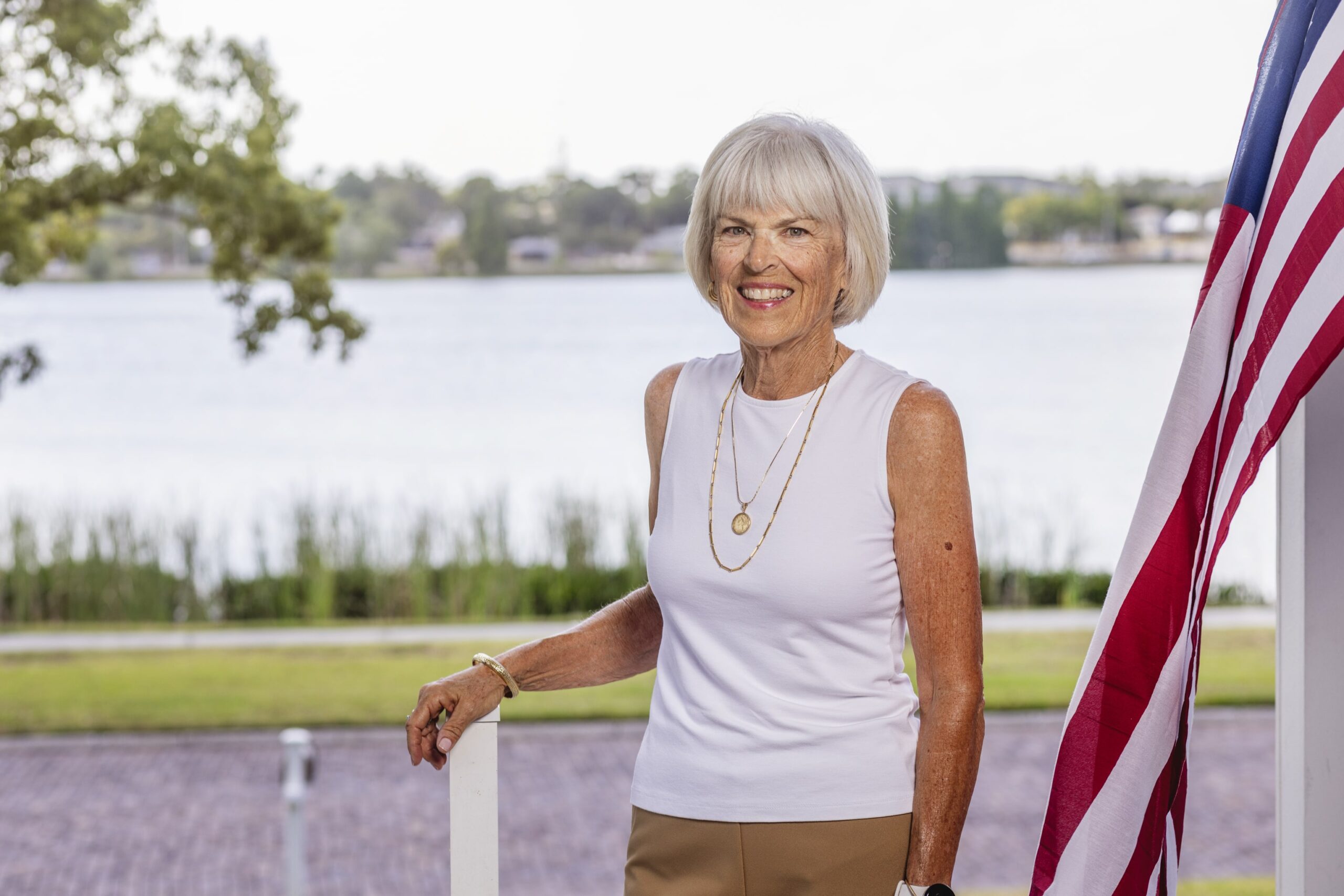 50/50 Image-min Woman Outside Standing Front Of Lake