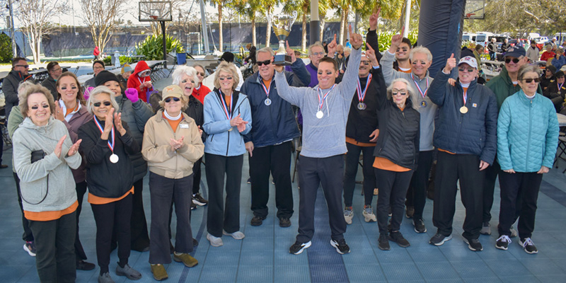 2026 Westminster Games winning team Westminster Winter Park raise their trophy