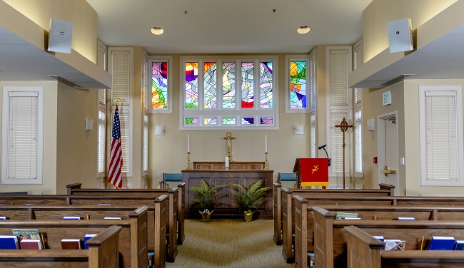 large chapel with stained glass window