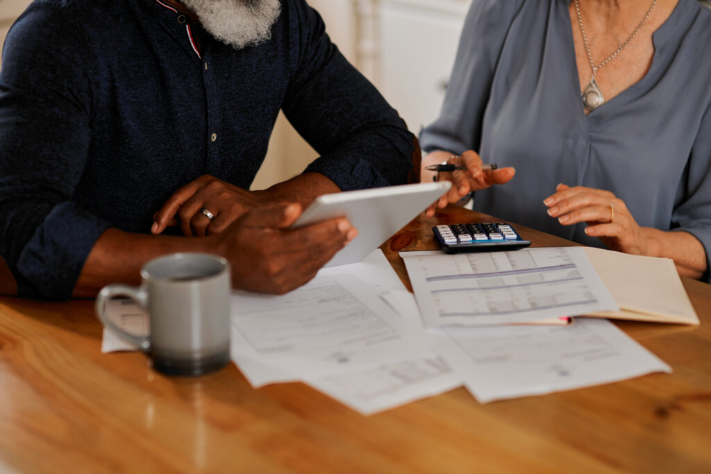 Senior couple reviewing financial options together