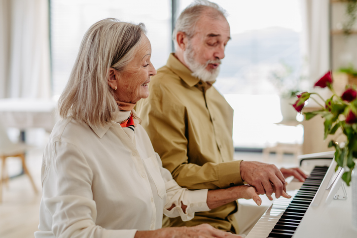 Brain health for seniors includes learning new tasks, such as playing the piano