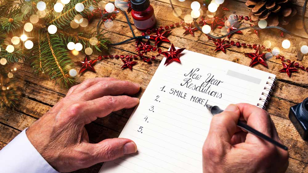 senior writing down new years resolutions