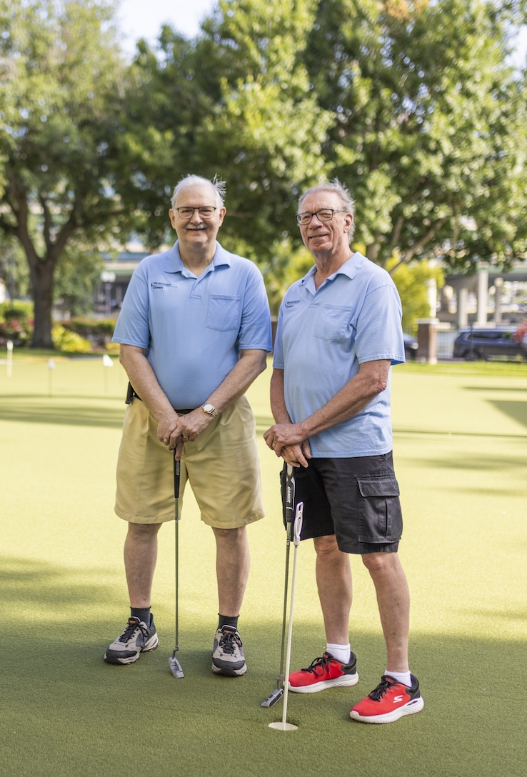 Two residents playing golf at Westminster Towers